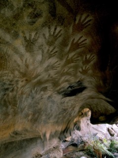 Ancient Australian Aboriginal rock Art comprising of 866 stencilled motifs of splatter over hand, snakes and kangaroos