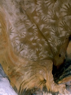 Ancient Australian Aboriginal rock Art comprising of 866 stencilled motifs of splatter over hand, snakes and kangaroos