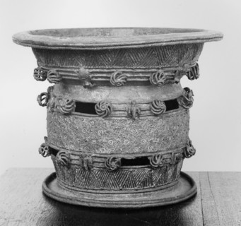 A bronze ceremonial wine bowl