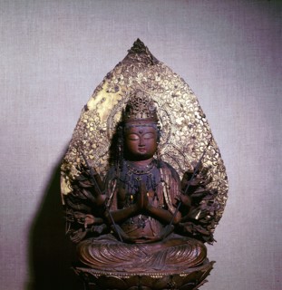 Buddha seated on a lotus flower