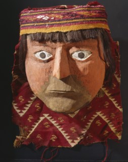 Mask with headband and human hair probably from a mummy bundle