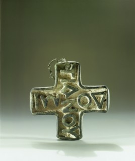 A cruciform bronze stamp for commemorative bread