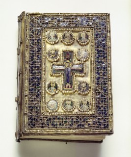 A binding of a liturgical book which is richly encrusted with enamels and pearls