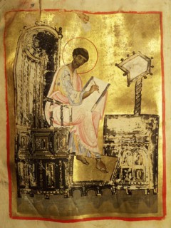 A illumination depicting St Mark writing at his desk