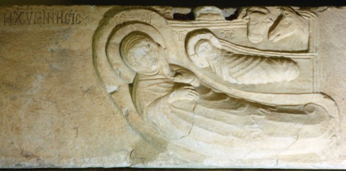 Slab with representation of the nativity scene, watched by animals