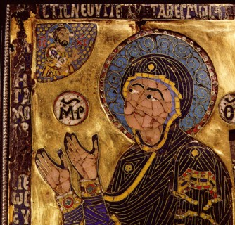 A small gold and enamelled reliquary which would have been worn around the neck to protect the owner from harm