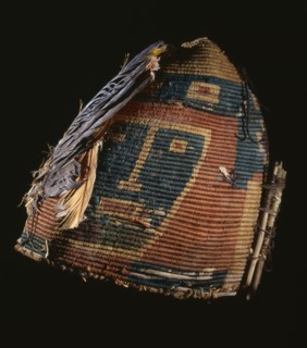 Fez style hat with feather plumes