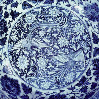 Detail of a blue and white plate with representations of the male and female phoenix