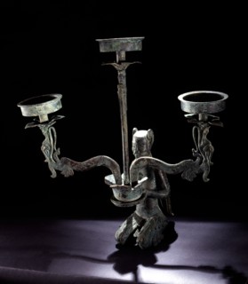 Archaic candelabra depicting a xian