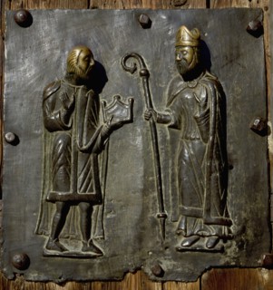 Detail of the bronze door of the Basilica of San Zeno which is decorated with 48 panels illustrating biblical stories and the lives of St Peter, St Paul, St Zeno, St Helena among others, and items con...