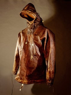 Waterproof sealskin parka with cords around the wrists, face and waist