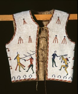 Beadwork decoration on a sleeveless jacket showing fighting between Indians and white men