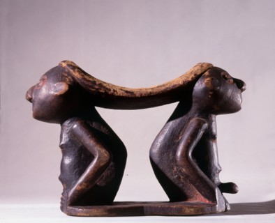 Twa pygmy headrest supported by male and female figures