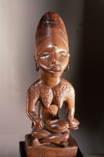 Mother and child carving (phemba) honouring female reproductive power, an idealised image of womens role, and by implication of the growth and wealth of the kingdom