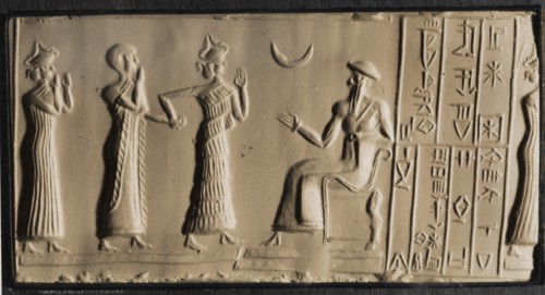 Depiction of a bare deaded worshipper being led by a minor goddess into the presence of a seated man, possibly the deified U Nammu, King of Ur