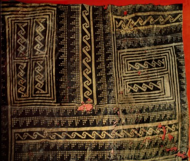 Woven cotton fabric painted with a geometric pattern