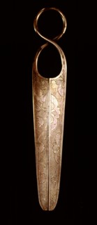 This pair of silver scissors illustrates some of the techniques introduced during the Tang dynasty from Persia