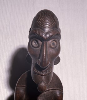 An ancestral figure known as a moai kavakava, emaciated man, worn hung onto its owner at dances and feasts