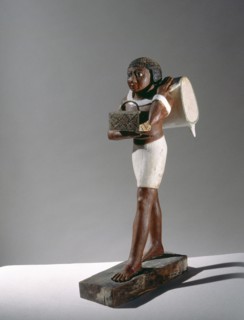 Wooden statuette of a bearer from the tomb of Niankhpepi, supervisor of Upper Egypt, chancellor of the king of lower Egypt, at Meir