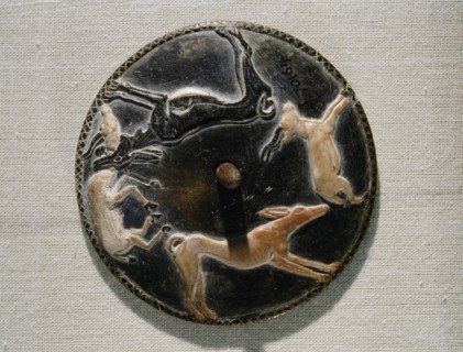 A gaming disc, one of 45 made of various materials and variously decorated, found in the mastaba of Hemaka, an official of King Den