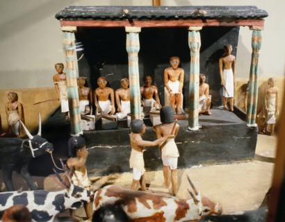 Wooden model depicting the tomb owner Meketre and his son, assisted by scribes and herdsmen, inspecting and counting his livestock