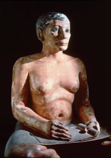 The Scribe du Louvre shows a man in the typical squatting posture of a scribe with a roll of papyrus on his lap