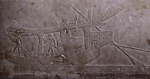 A limestone relief from the tomb of Ipi depicting a boat with its sail furled and carrying a huge block of stone