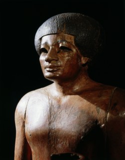 Sculpture of a male figure, thought to be from the funerary temple of Mentuhotep at Deir el Bahari