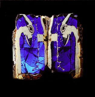Glass fragments, two joined halves, with an ankh sign & 2 was sceptres