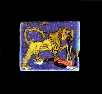 Glass plaque depicting a lion, representing the pharaoh, devouring a Nubian prisoner