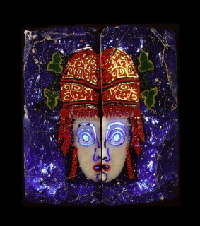Glass fragment, a hetaira ( courtesan ) theatrical half mask
