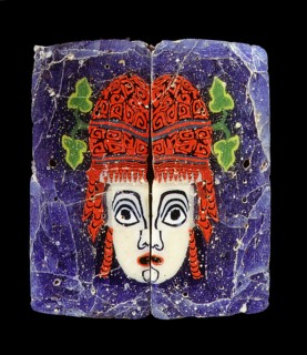 Glass fragment, a hetaira ( courtesan ) theatrical half mask