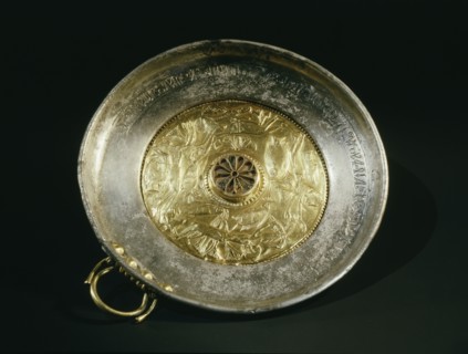 Silver bowl with gold handle and inset repousse gold centre, decorated with an aquatic scene showing four young girls swimming amongst lotus flowers and fish