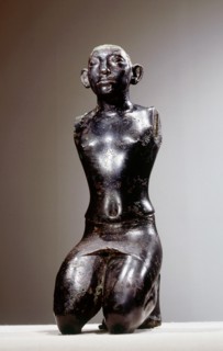 Statue of King Amenemhat III in kneeling posture