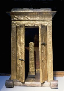 The little golden shrine of Tutankhamun containing the pedestal with the kings nomen and prenomen