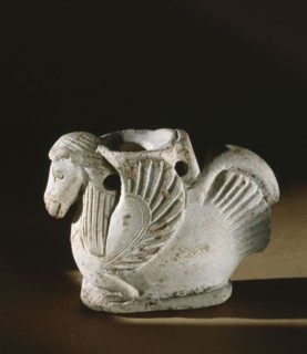 Unusual ointment container in the form of a bird with a horses head