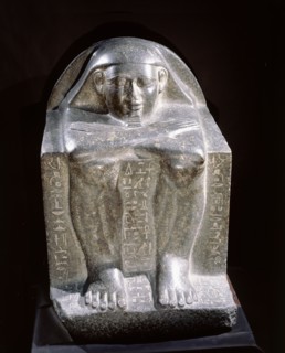 The two block statues of Hotep in Cairo Museum are the earliest known examples of what was to become a popular form