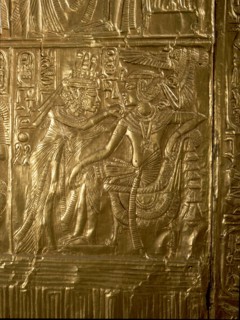 A detail of the gilt shrine of Tutankhamun which originally contained statuettes of the royal couple