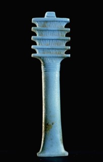 Blue glass furniture inlay depicting a djed (stability) pillar which by the New Kingdom was regarded as a symbol of Osiris