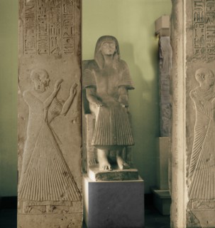Limestone statue and two pillars with reliefs of adorants from the tomb of Ptahmose, priest in the temple of Ptah