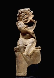 Terracotta image of a comedy actor in a comic mask, representing a slave who has run away and found sanctuary in a temple