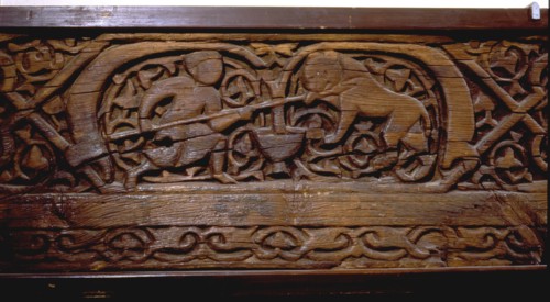 Wood plank with daily life scenes in the Fatimid court