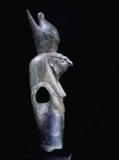 Fragment of statue depicting Horus wearing the double crown of upper and lower Egypt