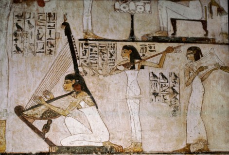 A detail of a wall painting in the tomb of Rekhmire showing women playing the harp, lute and tambourine