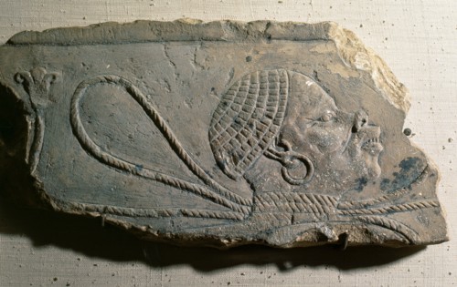 A fragment of a relief with a depiction of a Nubian slave