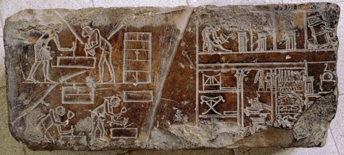 A relief fragment with a representation of stonemasons and other craftsmen at work and a cross section of a house
