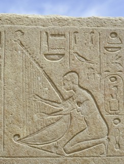 Detail of a relief depicting a musician, originally from the Red Chapel of Hatshepsut