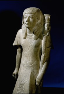Statuette identified as either a priest of Hathor or of Mut, wife of the God Amun, found in the court of the temple of Amun at Karnak