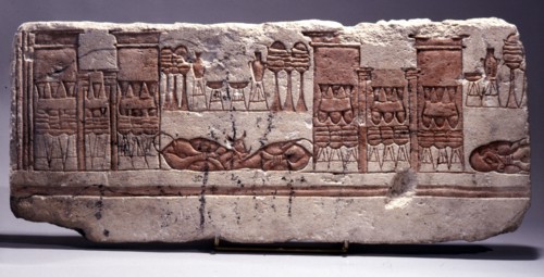 A fragment of a relief depicting animal and food offerings