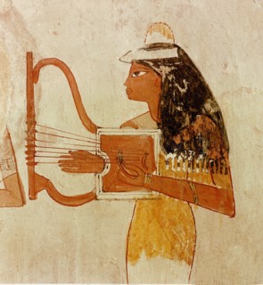 A detail of a wall painting in the tomb of Zeserkaresonb depicting a lady playing a lyre